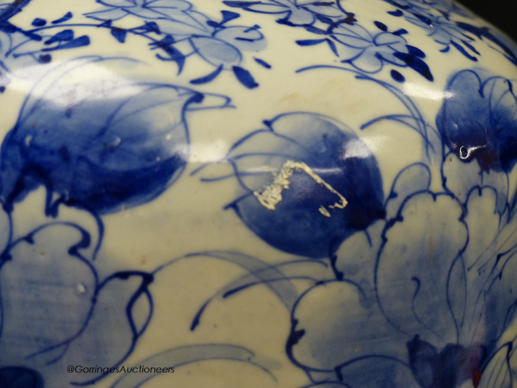 A pair of large Japanese blue and white vases (one a.f.), 60cm high